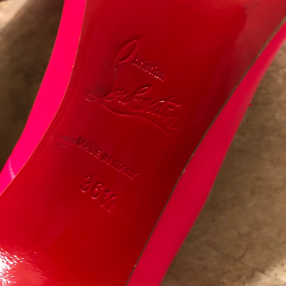 Christian Louboutin neon pink heels